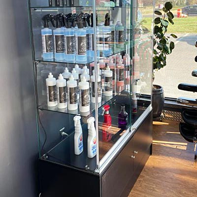 A display case inside a salon stocked with skin and hair products